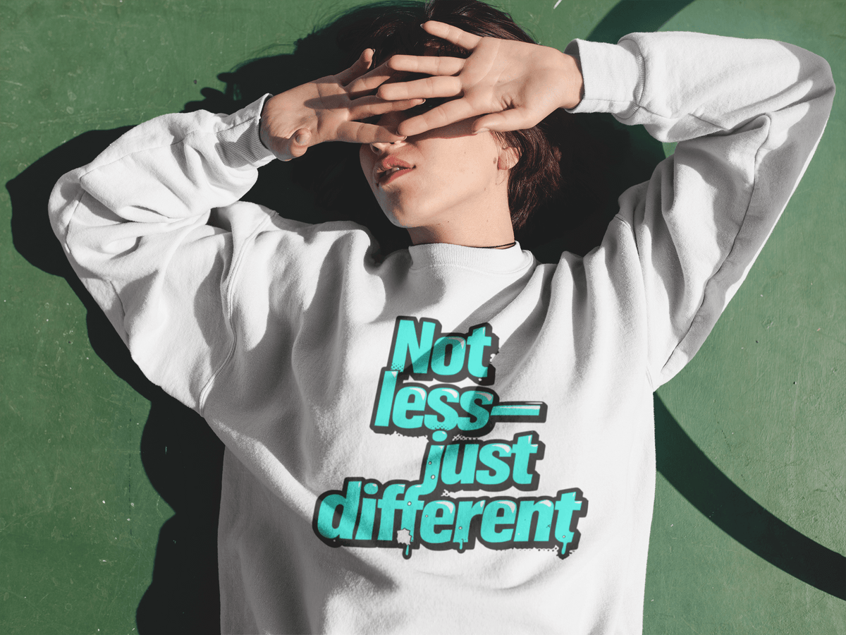 Crewneck Sweatshirt — “Not Less — Just Different” Bold Teal Graphic - Estrella & The Stars